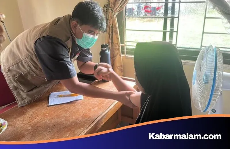 Sentuhan Kemanusiaan di Tepian Cerenti: Klinik Apung Polres Kuansing Hadir untuk Masyarakat